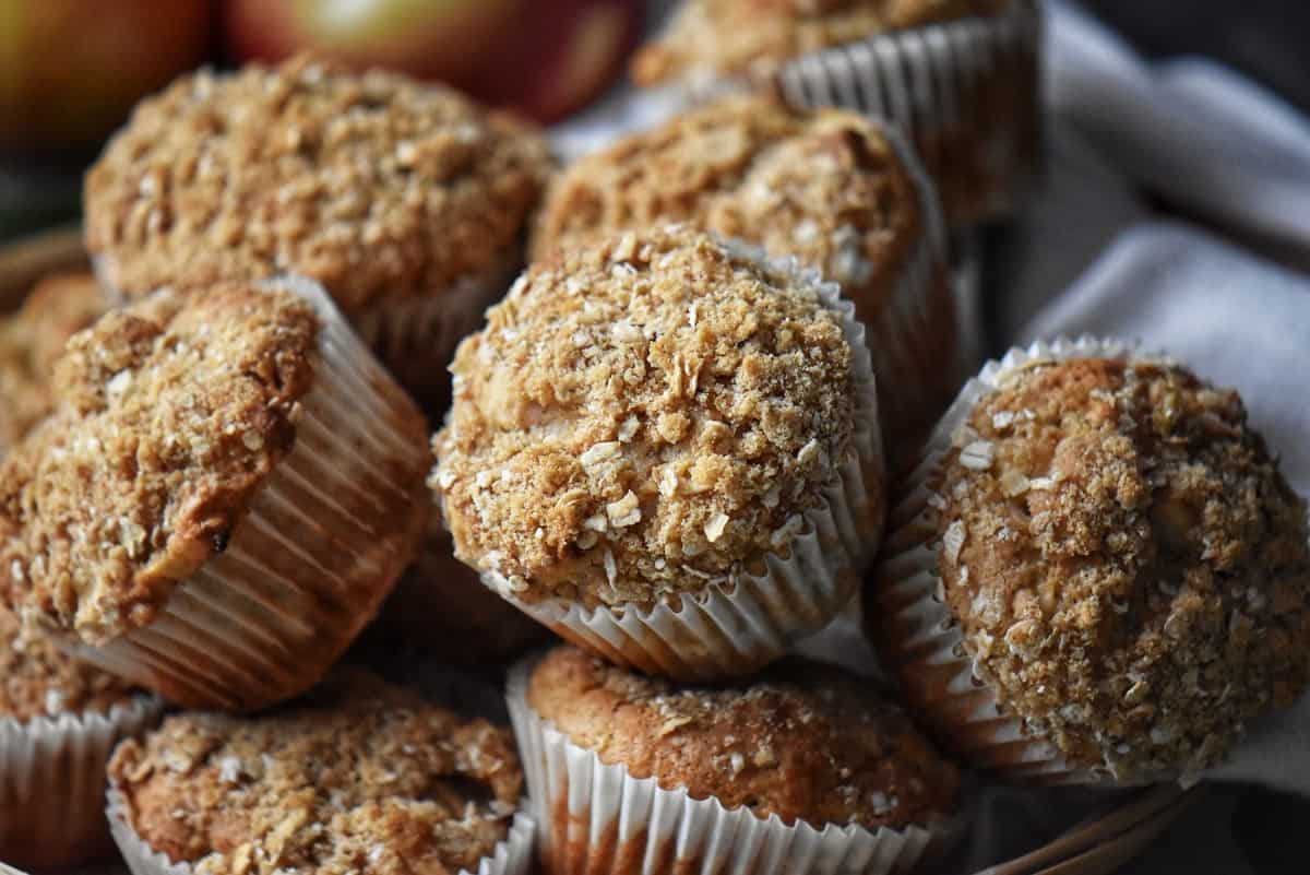 A close up shot of the crumbly oatmeal topping of the apple muffins.