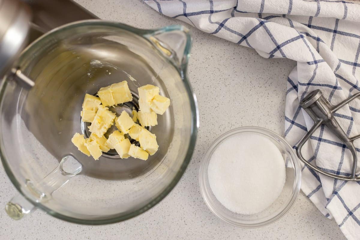 Softened butter in a mixing bowl about to be combined with sugar to make homemade Italian biscotti.