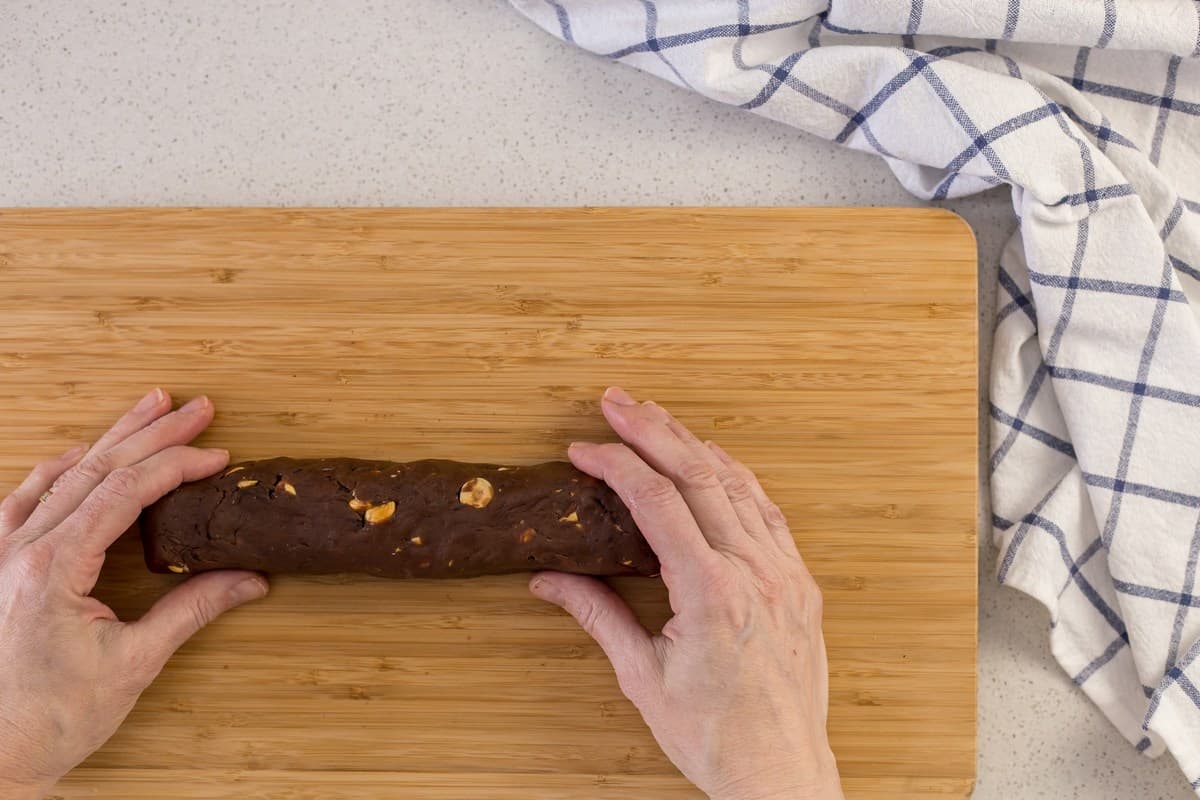 The chocolate biscotti dough is shaped into a log before being baked.