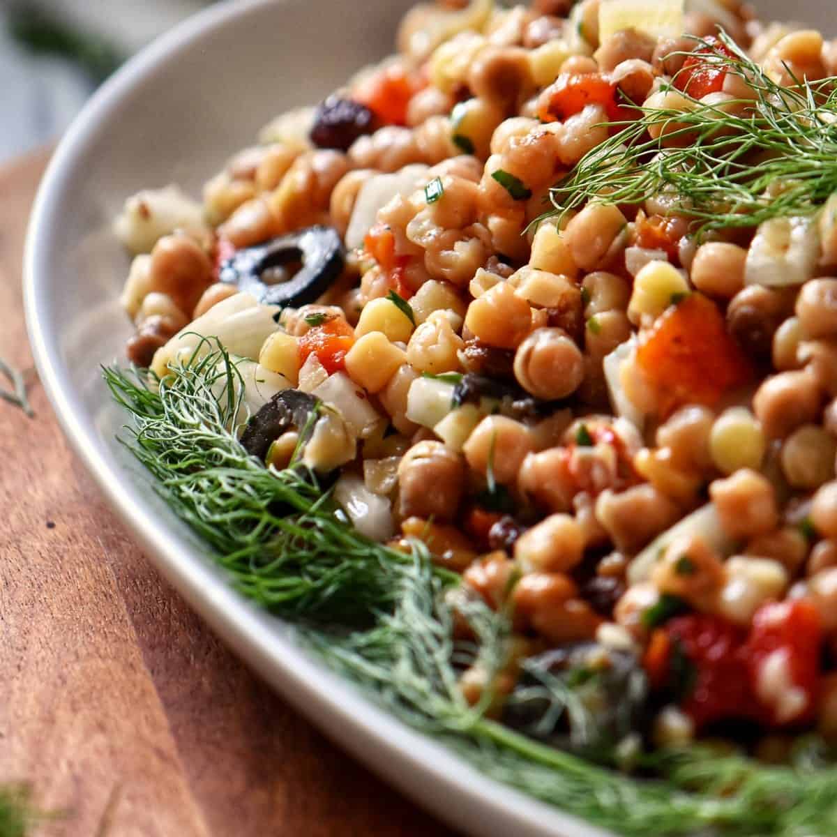 A serving bowl filled with fregola salad.