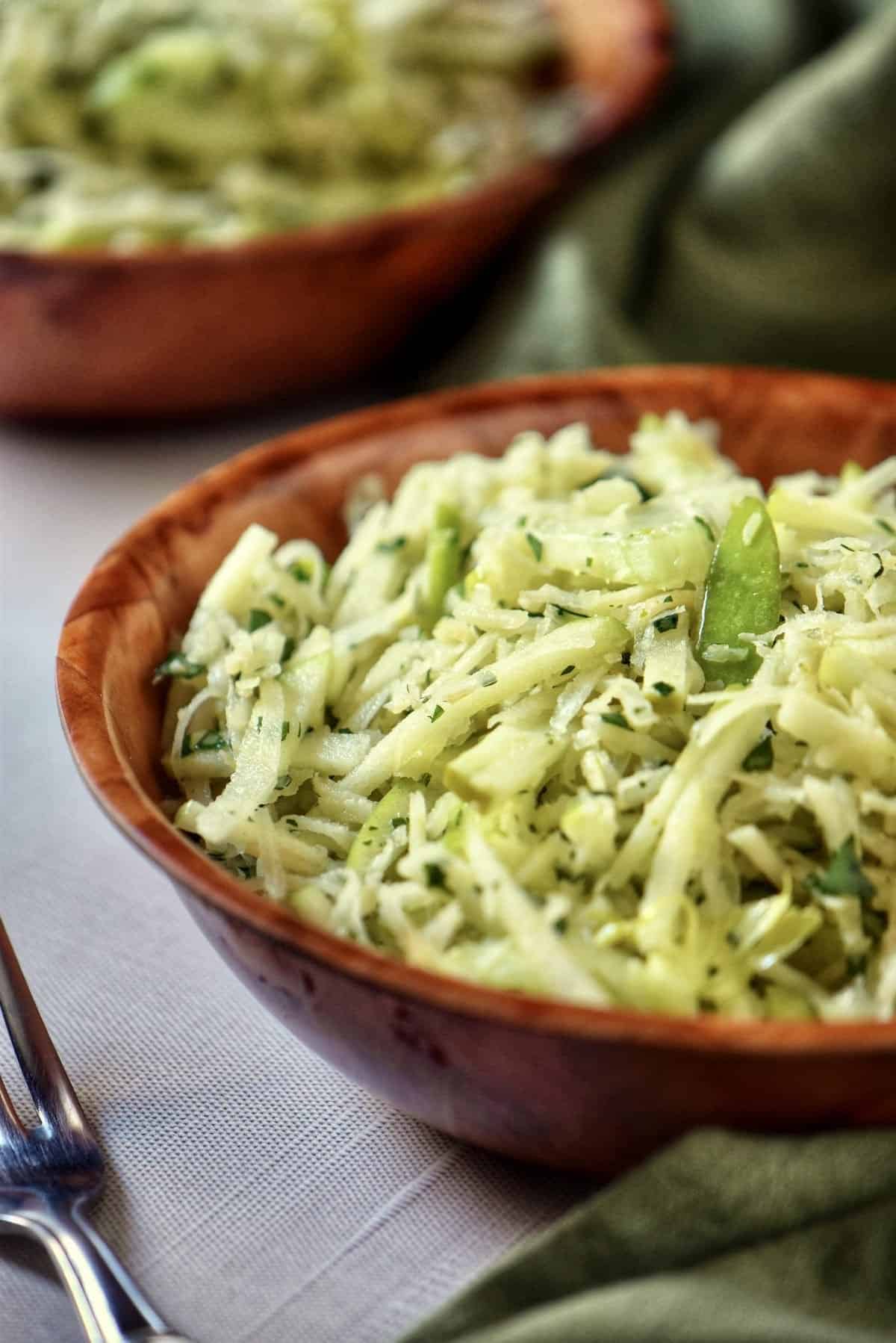 Creamy Celery Root and Fennel Slaw on a plate.