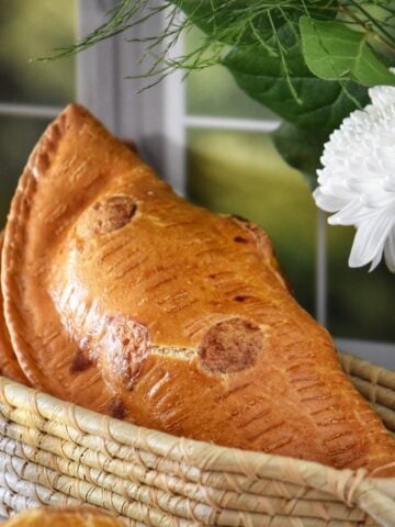 Italian savory cheese pies in a wicker basket.