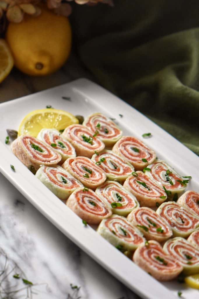 A plate of Smoked Salmon Pinwheels.