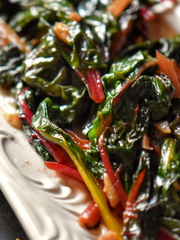 Sauteed Rainbow chard in a white plate.