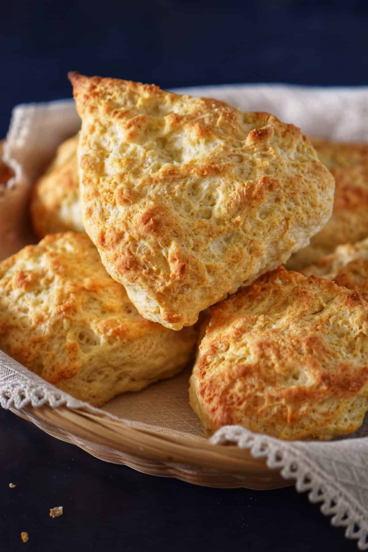 A stack of fluffy and tender homemade biscuits.