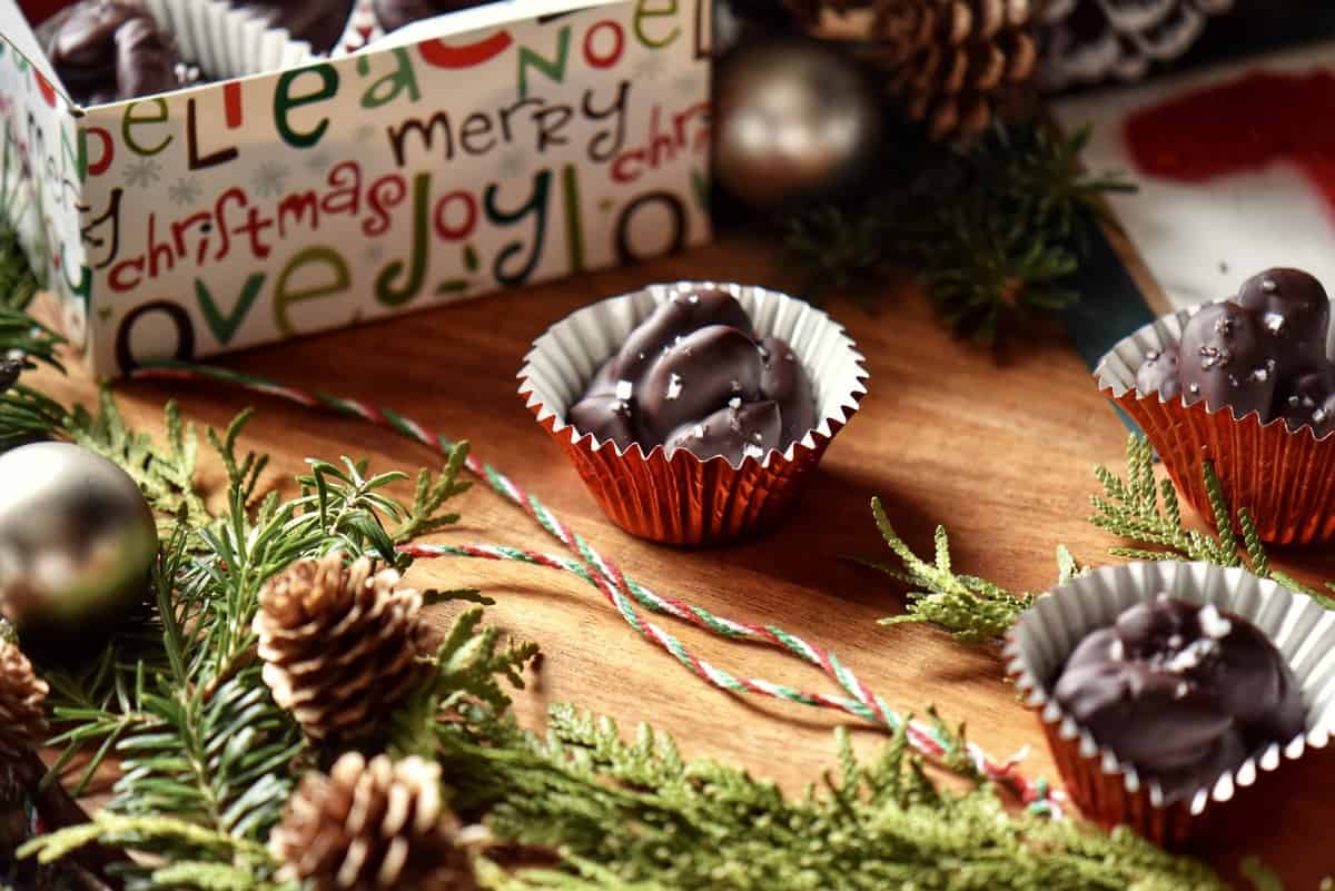 Chocolate clusters next to a box.