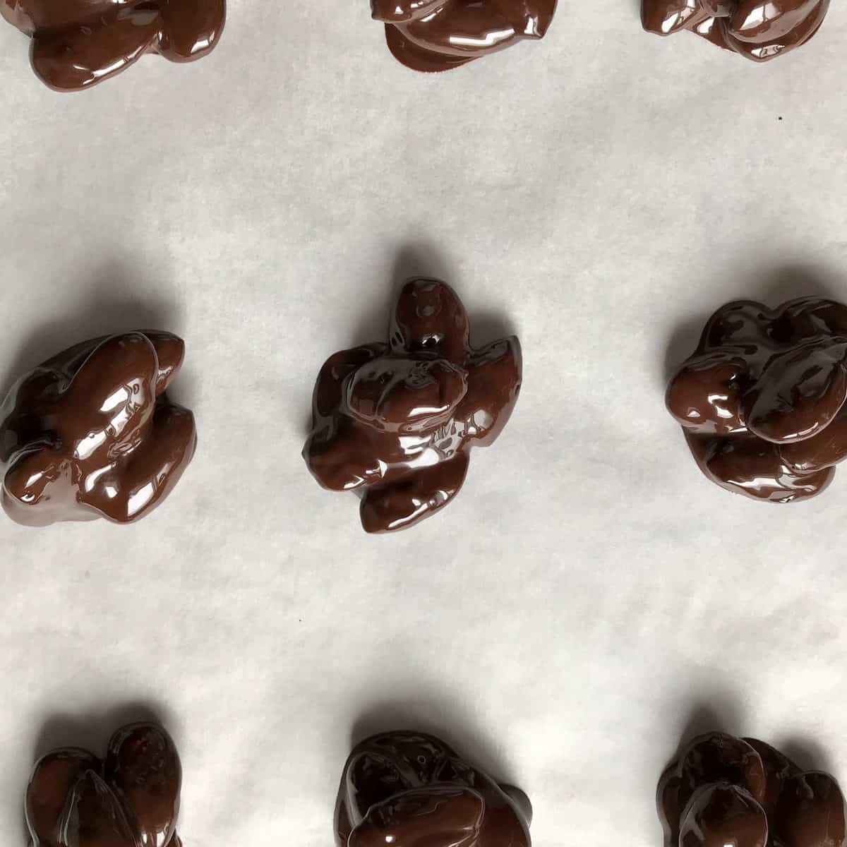 Choclate clusters on a baking sheet.