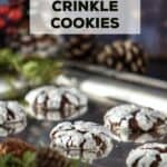 Chocolate crinkle cookies on a silver tray.