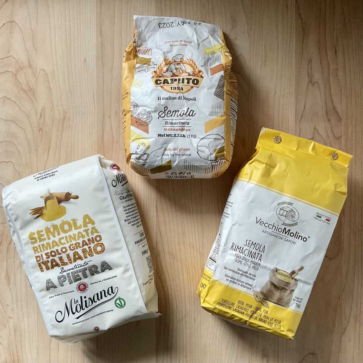 Packages of different types of semolina flour.
