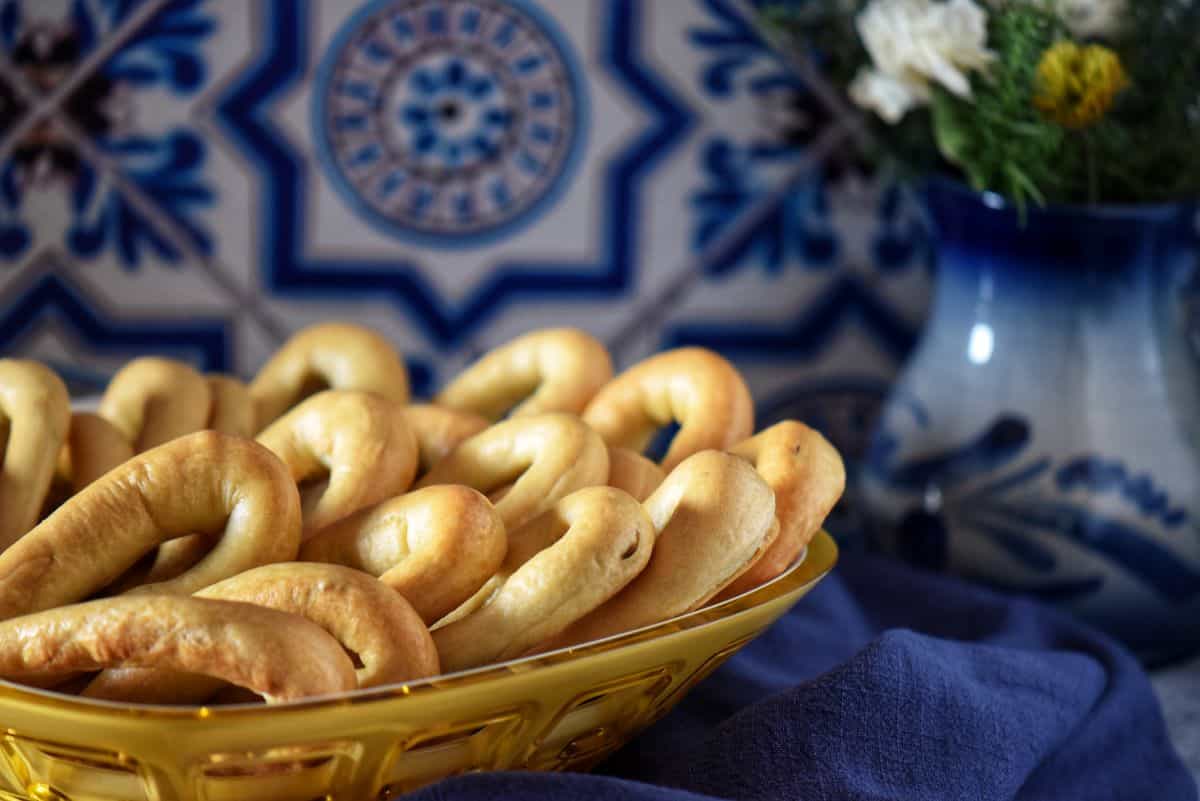 Dozens of taralli in a basket.