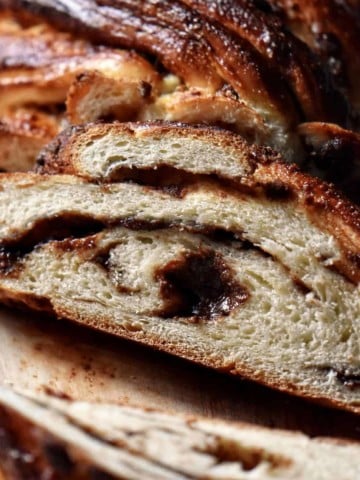 The soft interior of a braided bread recipe with a chocolate filling.