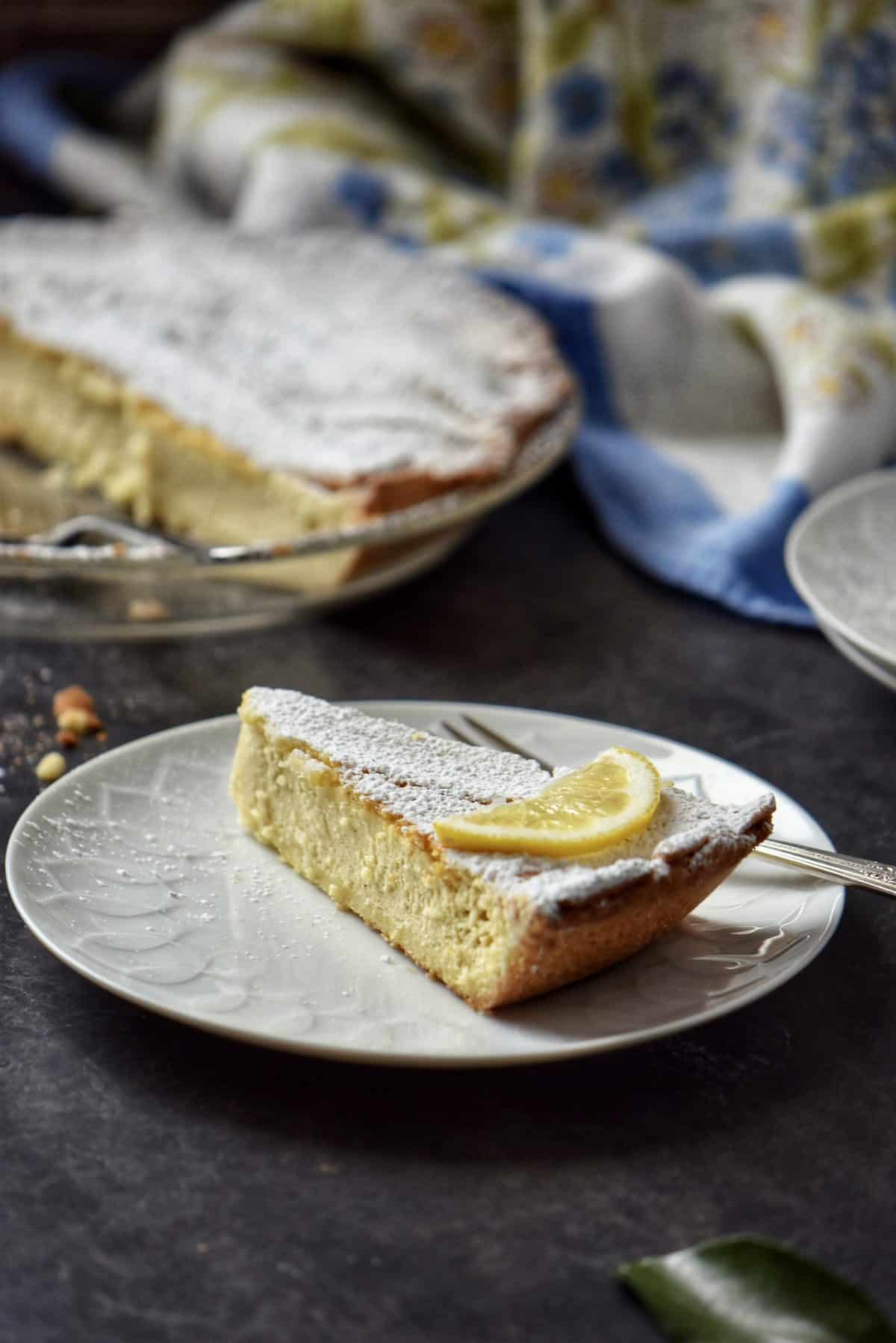 A piece of Italian Easter ricotta pie on a white plate. 