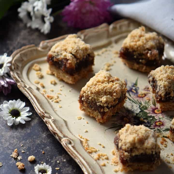 A close up of the top oat crumble of the date squares.