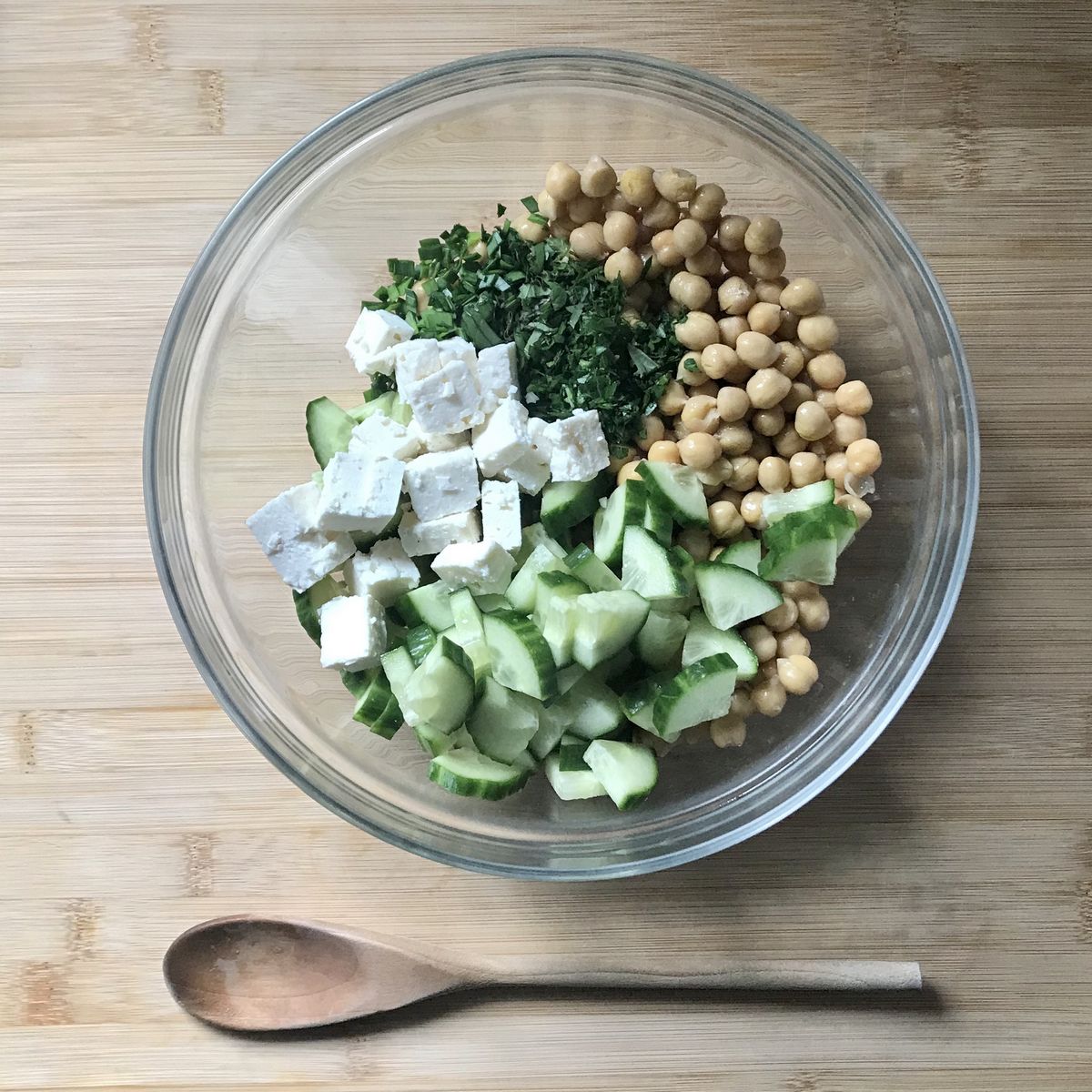 The salad ingredients in a large bowl.