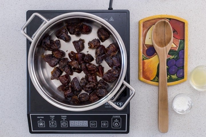 Medjool dates in a large sauce pan, about to be combined with lemon juice and cornstarch.