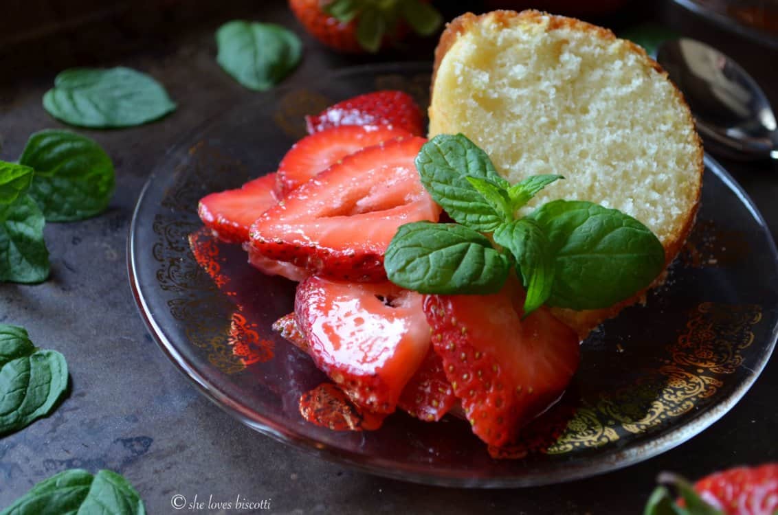 Italian cake served with macerated strawberries.