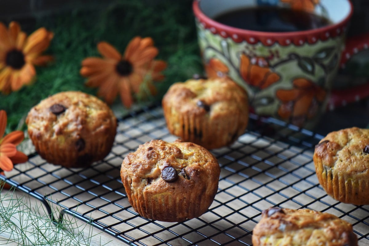 Zucchini muffins on a cooling rack.