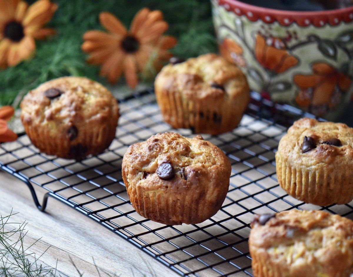 Zucchini muffins on a cooling rack.