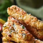 A stack of crispy looking Zucchini Sticks.