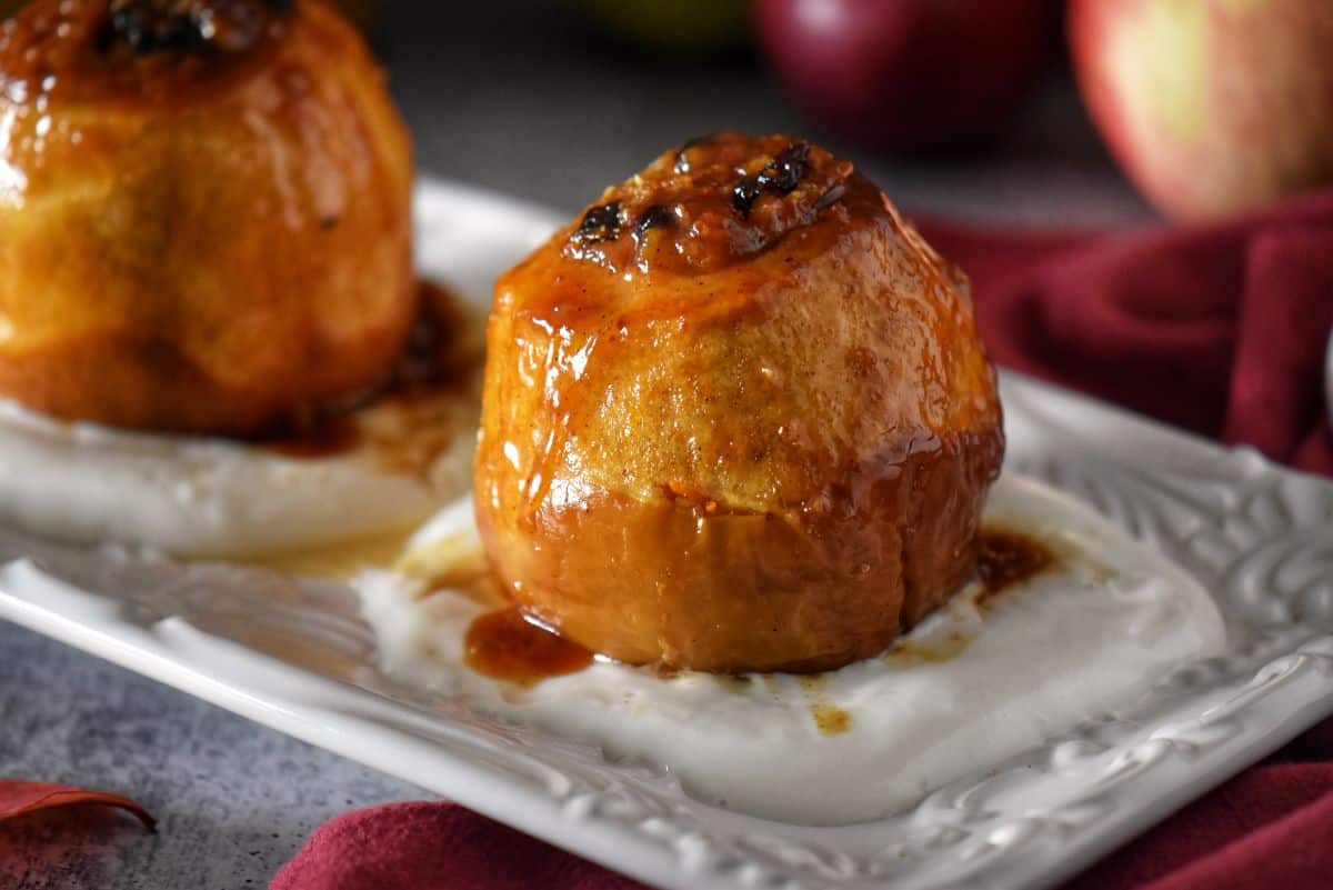 Warm baked apple served on whipped ricotta, drizzled with honey and pan juices.