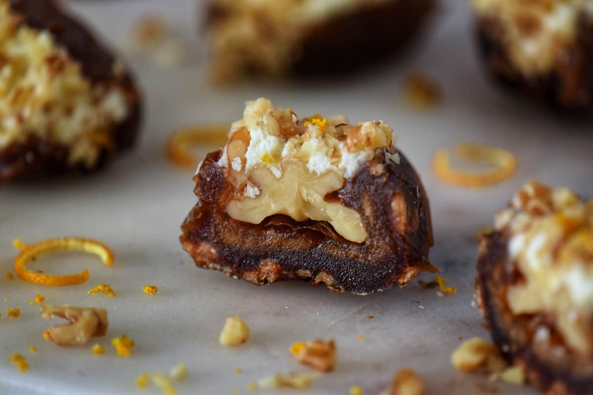 The creamy interior of a ricotta stuffed date.