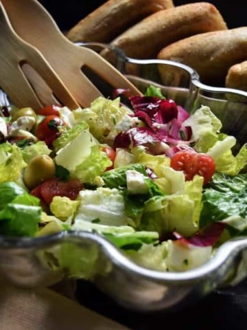 Different varieties of salads in a bowl make this Italian Salad Recipe look very appetizing.