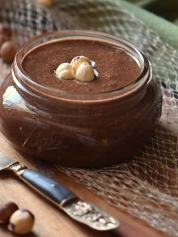 Homemade cocoa hazelnut spread in a mason jar.