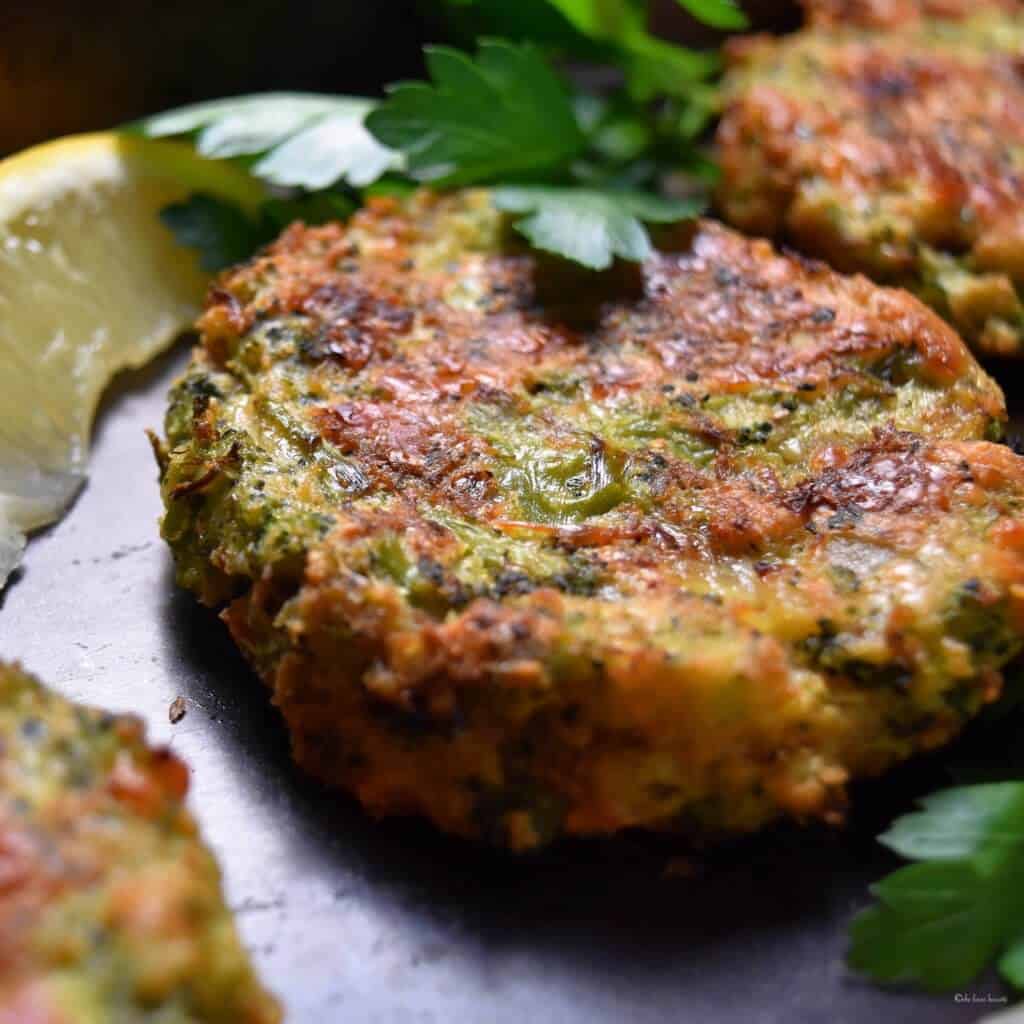 Broccoli fritters on a plate.