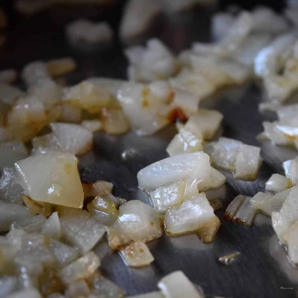Sauteed onions are becoming translucent.