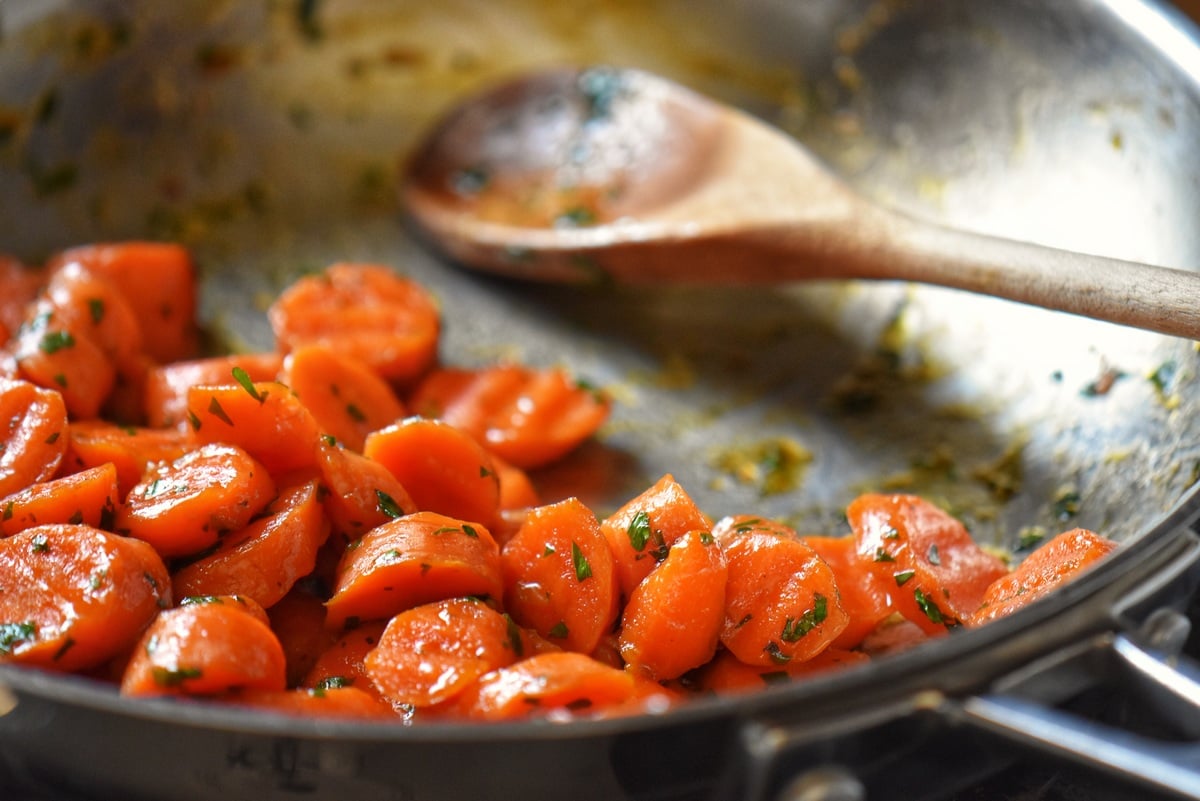 Carrots in the process of being glazed.