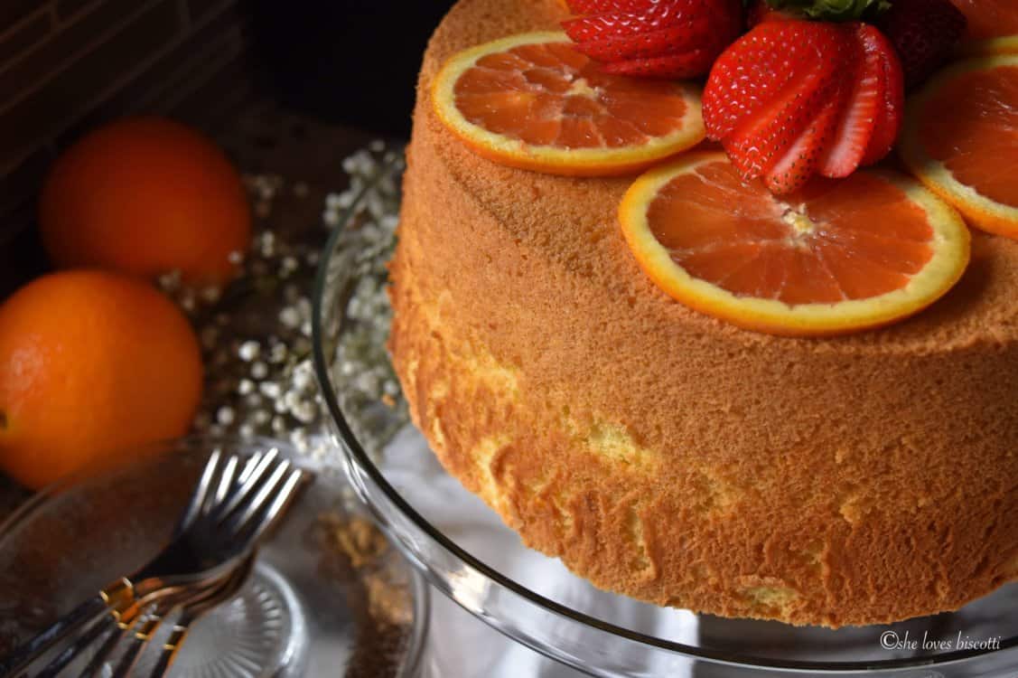 A side view of a cake on a stand.