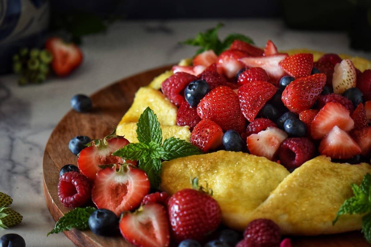 A close up shot of the berry crostata with the turbinado sugar glistening on the crust.