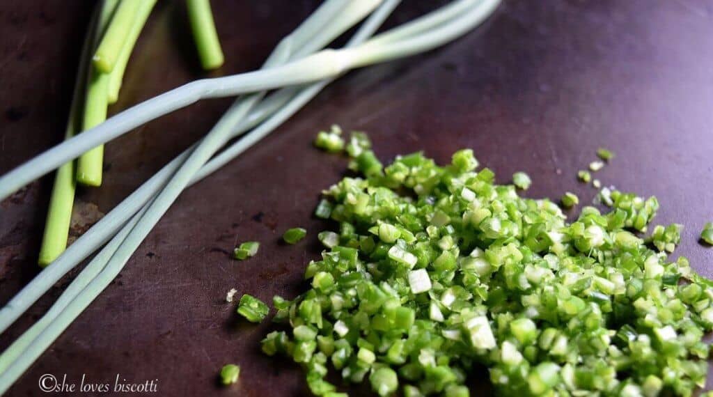 Chopped up garlic scapes.