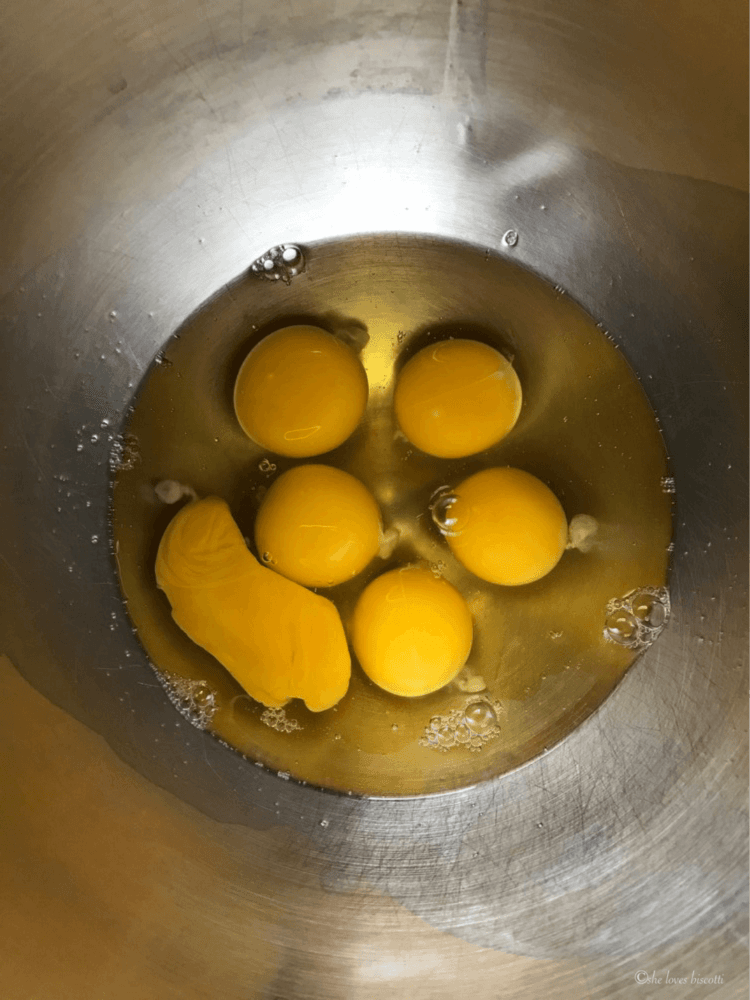 6 whole eggs in a bowl.