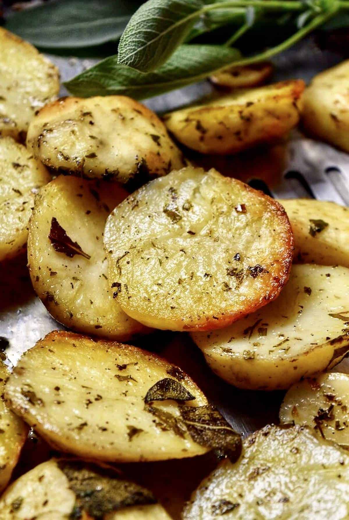 A sheet pan full of Crispy Italian Oven Roasted Garlic Potatoes