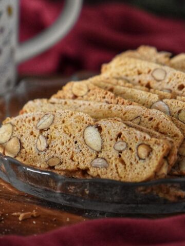 A few crispy almond bread biscotti in a serving dish.