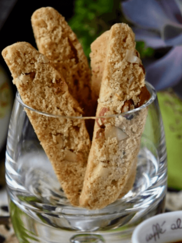 Close up picture of Almond Biscotti in a glass.