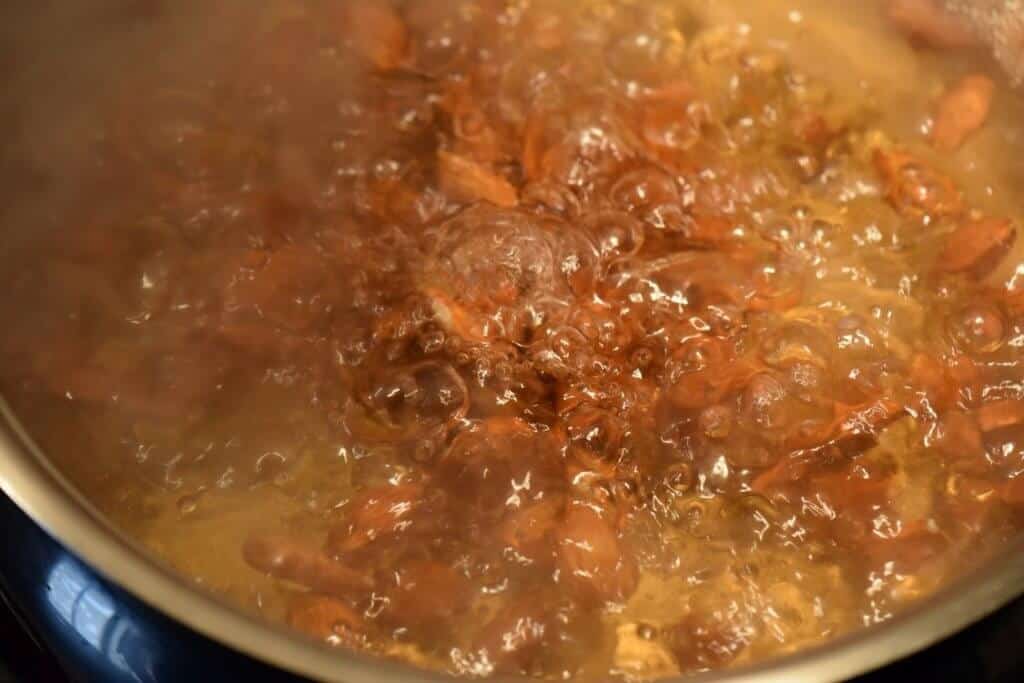 Almonds in a pot of boiling water.