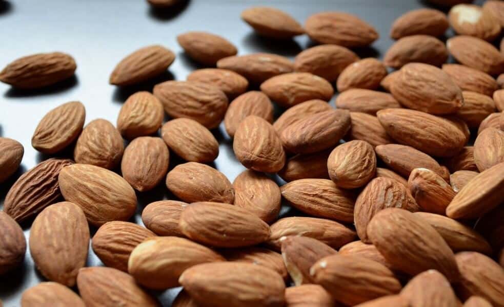 A close up of almonds with their skin.