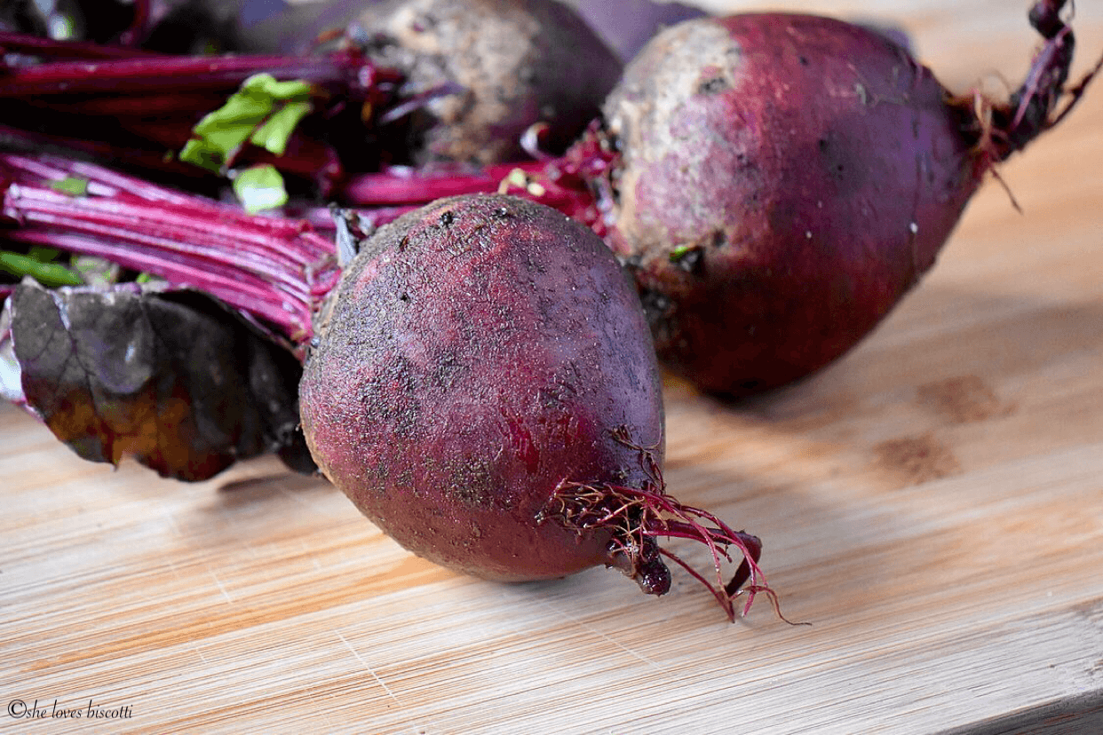 Close up beet root with beet greens.