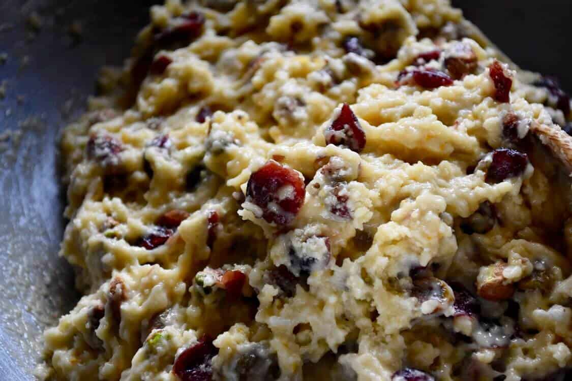 The combined dough with cranberries and pistachios.