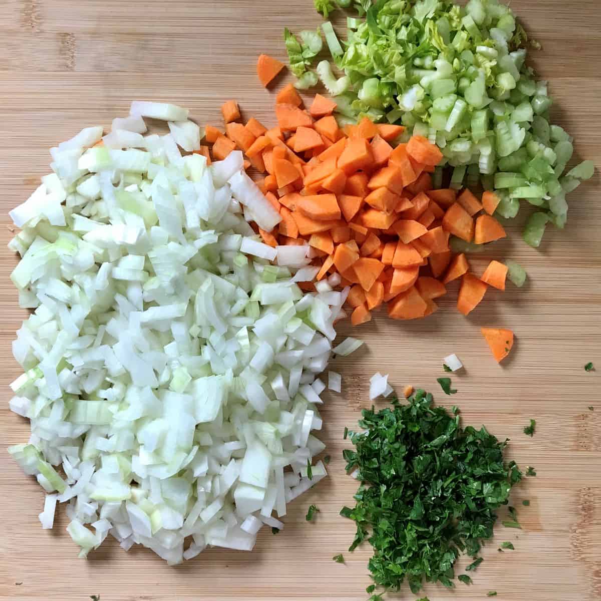 Diced vegetables on a cutting board.