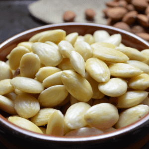 Round dish of blanched almonds.