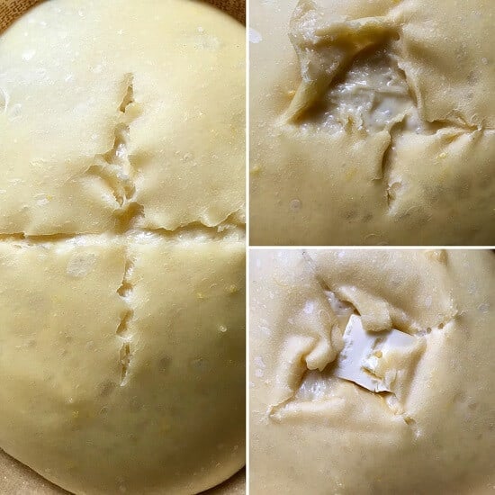 Cutting through the top layer of the panettone.