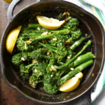 Sauteed Broccolini in a pan.
