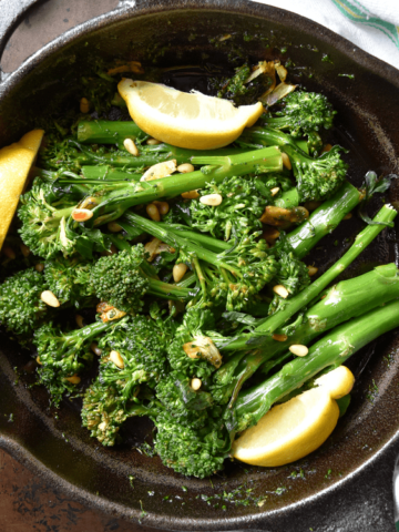 Sauteed Broccolini in a pan.