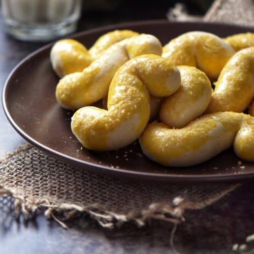 A small plate of homemade Italian S cookies.