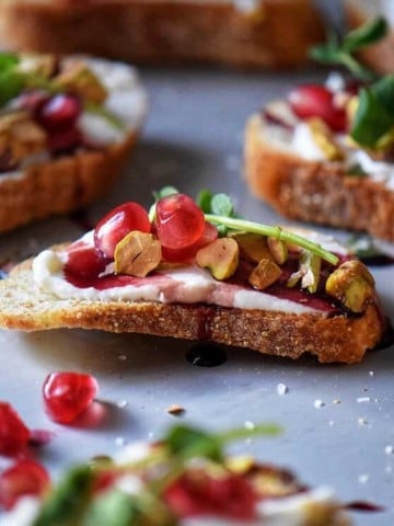 The completed Whipped Ricotta Pomegranate Crostini Recipe.