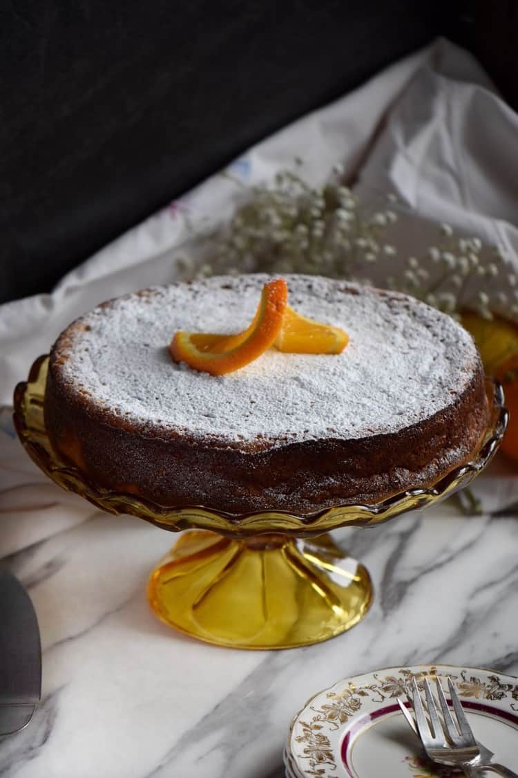 Rice ricotta Easter pie set on a depression era pedestal cake stand.