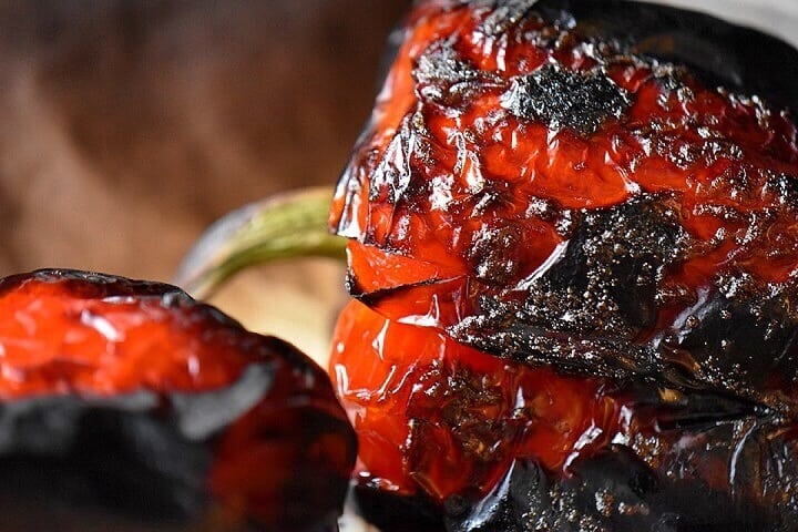 The charring of roasted red peppers.